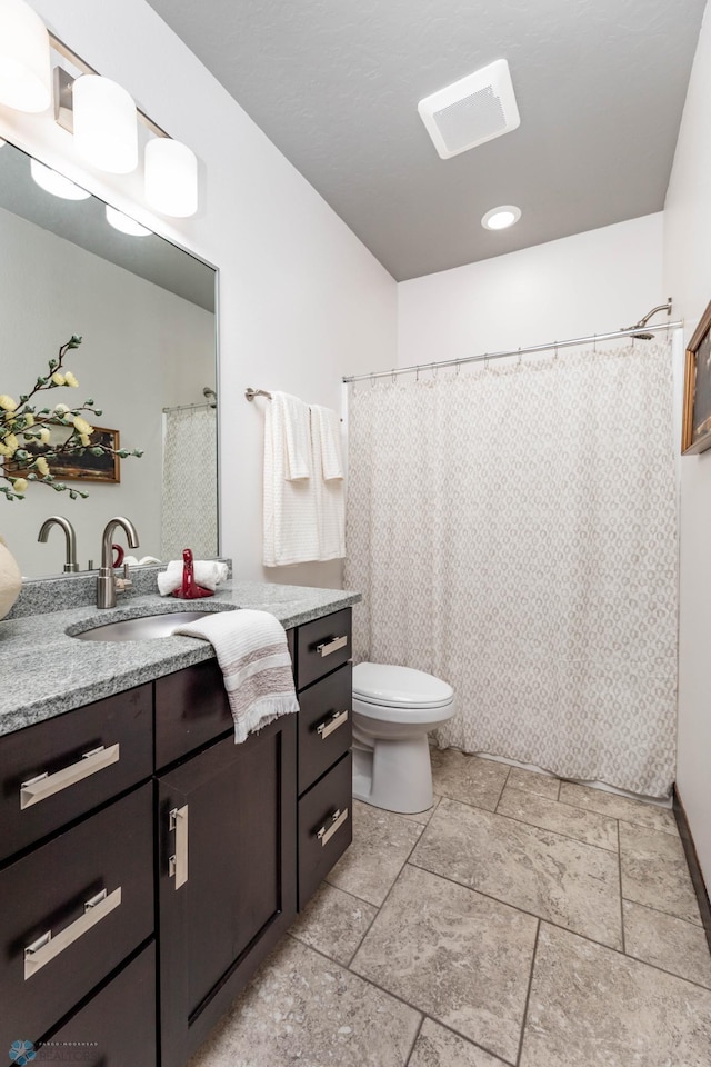 7373 14th St S, Fargo, ND 58104 - full bathroom featuring vanity and a shower with curtain