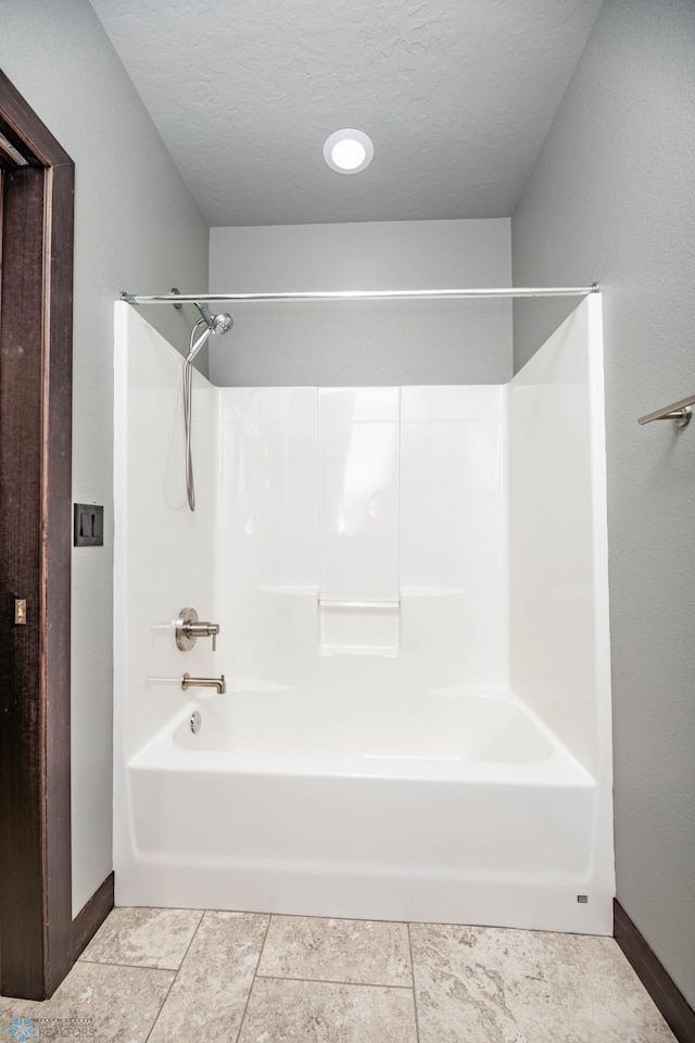 7373 14th St S, Fargo, ND 58104 - full bath with bathtub / shower combination and tile patterned flooring