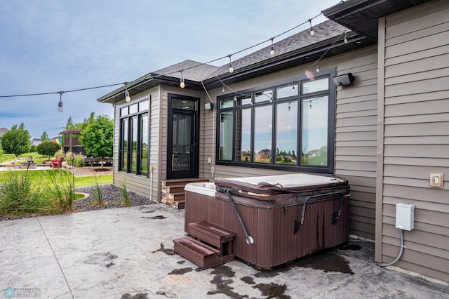 7373 14th St S, Fargo, ND 58104 - view of patio with a hot tub