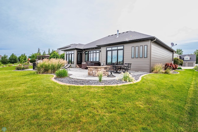 7373 14th St S, Fargo, ND 58104 - back of property with a patio and a yard