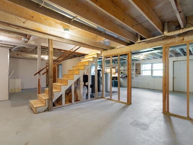 3568 Feldman Ave SE, Buffalo, MN 55313 - basement featuring stairway and water heater