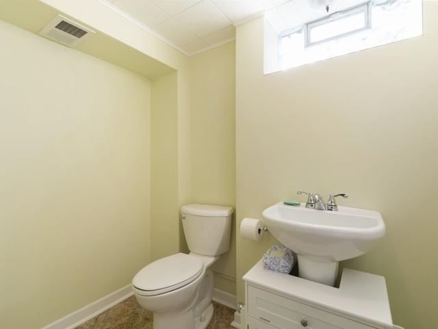 3568 Feldman Ave SE, Buffalo, MN 55313 - half bathroom featuring toilet and baseboards