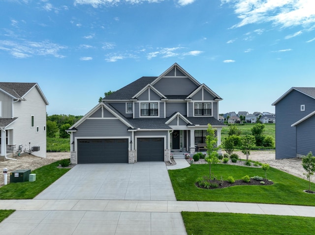 14714 146th Ave N, Dayton, MN 55327 - craftsman-style home with concrete driveway, an attached garage, a front lawn, covered porch, and stone siding