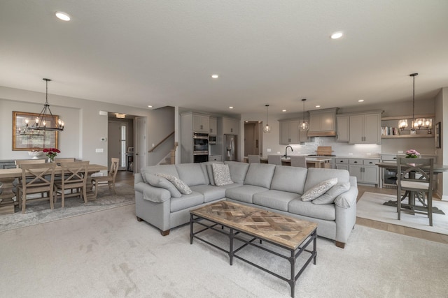 14714 146th Ave N, Dayton, MN 55327 - living area featuring a chandelier, light colored carpet, recessed lighting, and stairs