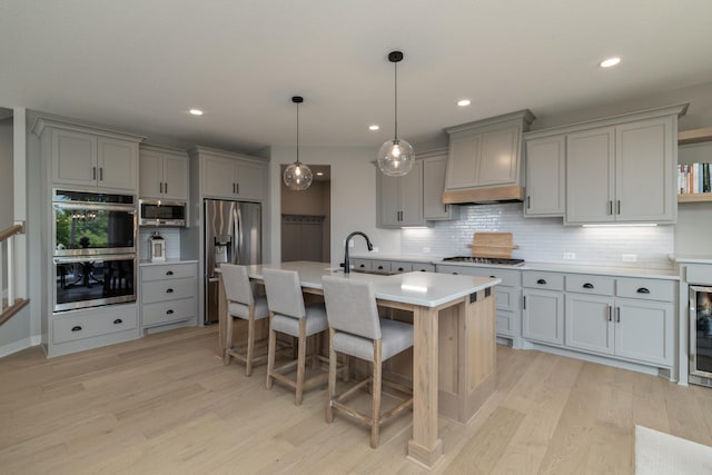 14714 146th Ave N, Dayton, MN 55327 - kitchen with gray cabinets, appliances with stainless steel finishes, premium range hood, and recessed lighting