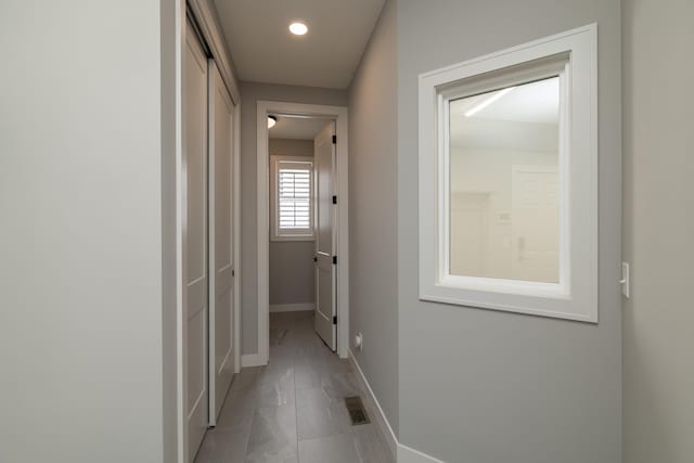 14714 146th Ave N, Dayton, MN 55327 - hall featuring light marble finish flooring and recessed lighting