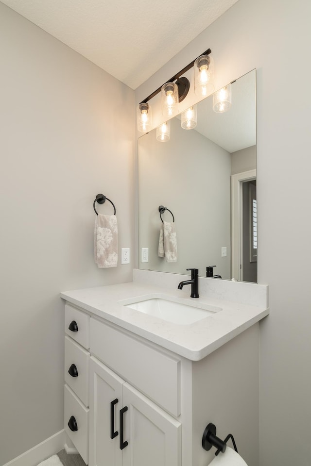 14714 146th Ave N, Dayton, MN 55327 - bathroom featuring vanity and baseboards