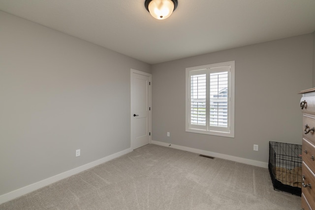 14714 146th Ave N, Dayton, MN 55327 - spare room featuring baseboards and light carpet