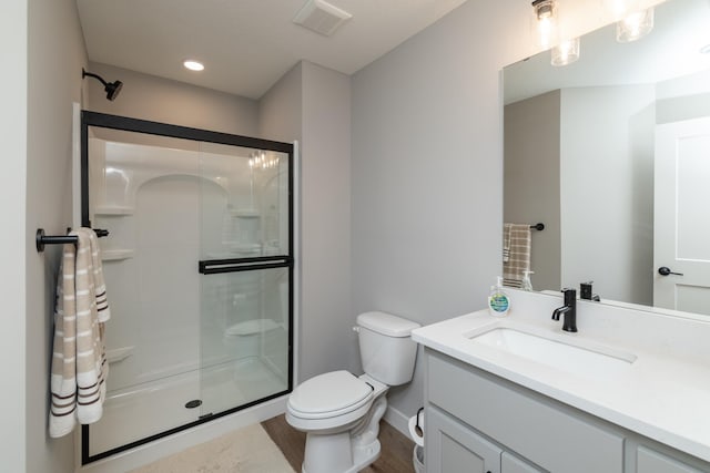 14714 146th Ave N, Dayton, MN 55327 - bathroom with vanity, a shower stall, and wood finished floors
