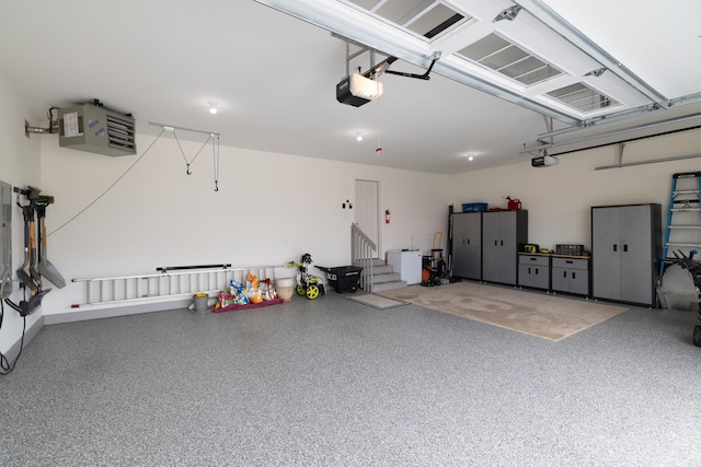 14714 146th Ave N, Dayton, MN 55327 - garage featuring a garage door opener and a heating unit