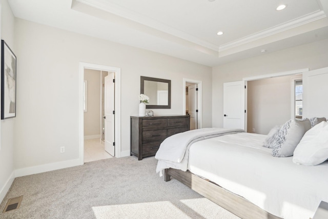 14147 77th Ln NE, Otsego, MN 55330 - bedroom featuring a tray ceiling, crown molding, recessed lighting, light carpet, and ensuite bath