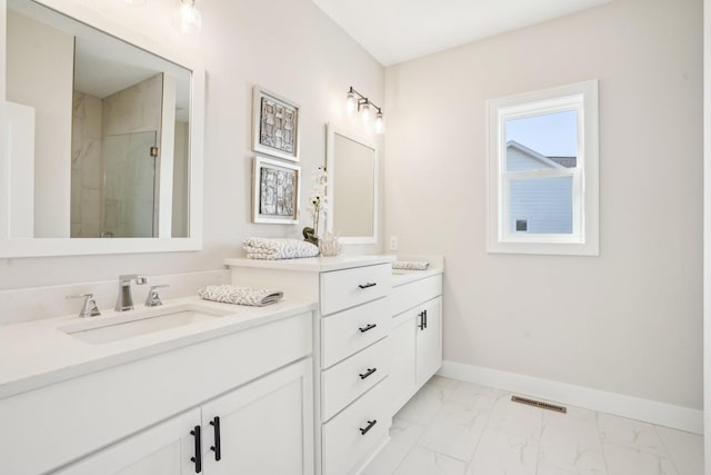 14147 77th Ln NE, Otsego, MN 55330 - full bathroom featuring marble finish flooring, vanity, and a stall shower