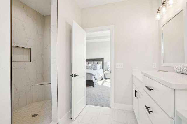 14147 77th Ln NE, Otsego, MN 55330 - ensuite bathroom featuring vanity, marble look tile flooring, and a marble finish shower