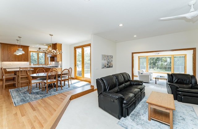 160 River Bluff Pl NW, Cascade Twp, MN 55901 - living room featuring a chandelier, recessed lighting, and light wood finished floors