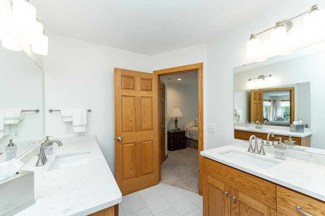 160 River Bluff Pl NW, Cascade Twp, MN 55901 - full bath featuring ensuite bath, two vanities, and tile patterned flooring