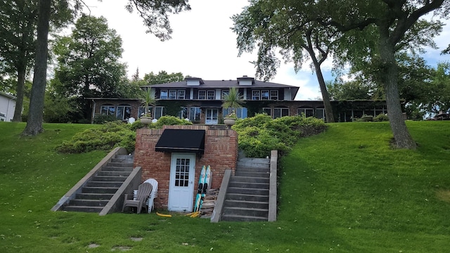 3307 Nokomis NE, Alexandria, MN 56308 - rear view of property with stairway and a lawn