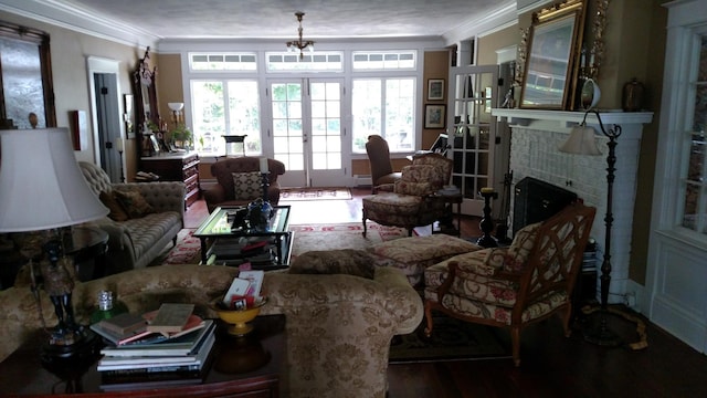 3307 Nokomis NE, Alexandria, MN 56308 - living area with ornamental molding, french doors, wood finished floors, and a brick fireplace
