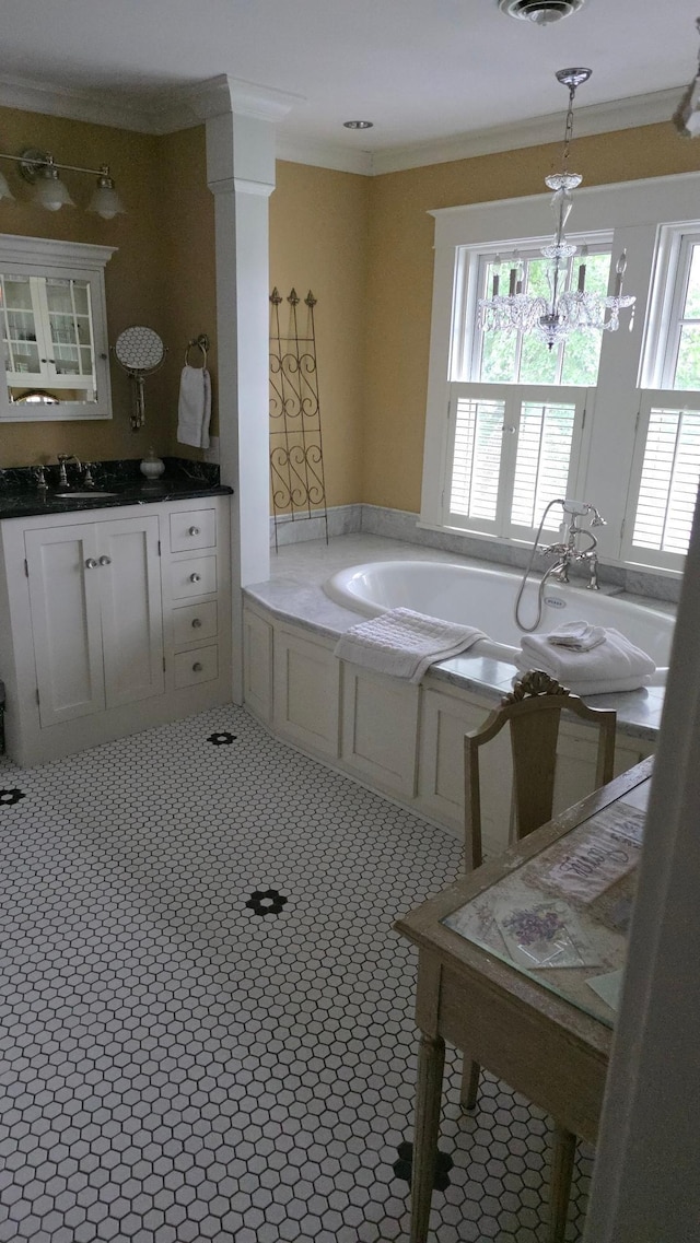 3307 Nokomis NE, Alexandria, MN 56308 - full bathroom featuring crown molding, plenty of natural light, a garden tub, vanity, and a chandelier
