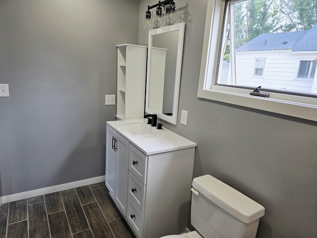 1204 10th St NE, Austin, MN 55912 - bathroom with vanity and wood tiled floors
