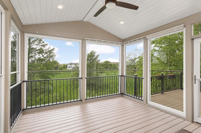 3153 Magnolia Dr, Medina, MN 55340 - unfurnished sunroom featuring lofted ceiling, ceiling fan, wood finished floors, and healthy amount of natural light