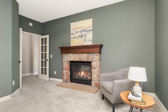 3153 Magnolia Dr, Medina, MN 55340 - living area featuring carpet floors, a fireplace, and french doors