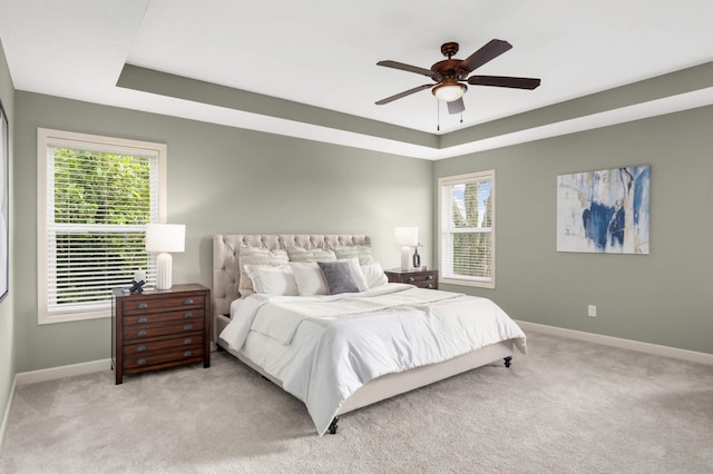 3153 Magnolia Dr, Medina, MN 55340 - bedroom featuring a raised ceiling, carpet floors, and ceiling fan