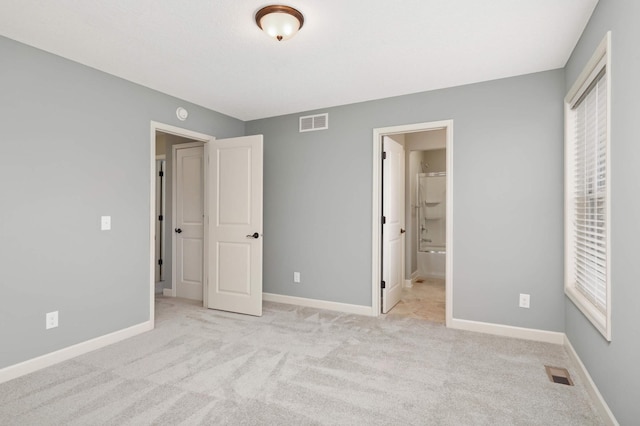 3153 Magnolia Dr, Medina, MN 55340 - unfurnished bedroom featuring carpet flooring and connected bathroom