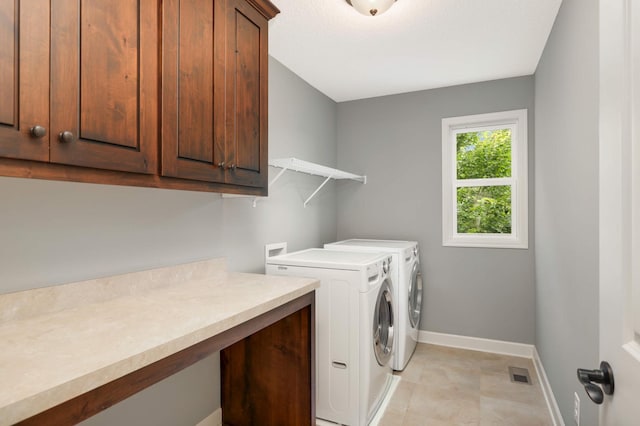 3153 Magnolia Dr, Medina, MN 55340 - laundry area featuring cabinet space, washer and dryer, light tile patterned flooring, and an office area