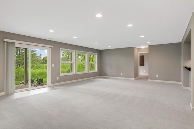 3153 Magnolia Dr, Medina, MN 55340 - spare room with plenty of natural light, light carpet, and recessed lighting