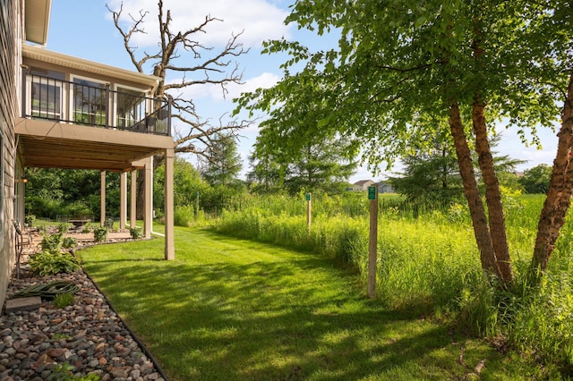 3153 Magnolia Dr, Medina, MN 55340 - view of green lawn with a balcony