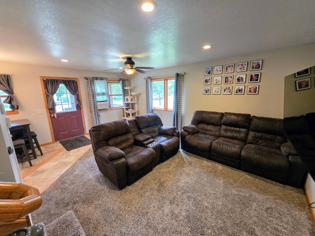 825 2nd Ave, Grand Rapids, MN 55744 - living room featuring recessed lighting, healthy amount of natural light, ceiling fan, a textured ceiling, and cooling unit