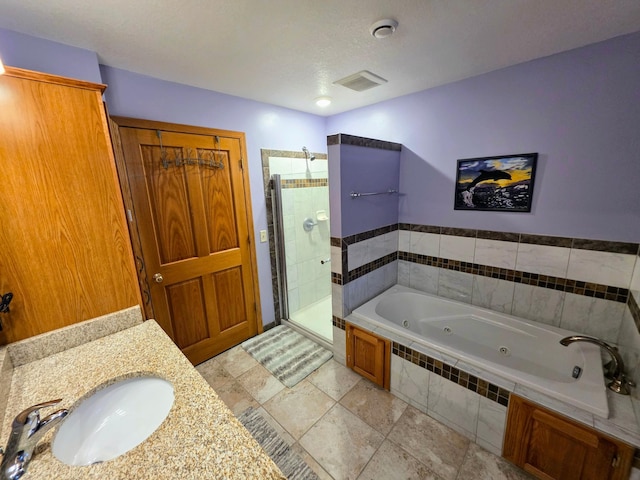 825 2nd Ave, Grand Rapids, MN 55744 - bathroom with a stall shower, a jetted tub, and vanity