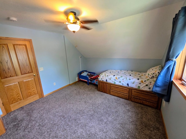 825 2nd Ave, Grand Rapids, MN 55744 - carpeted bedroom with vaulted ceiling and ceiling fan