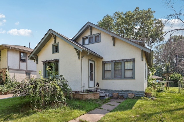 116 3rd Ave SE, Osseo, MN 55369 - view of front of house featuring stucco siding