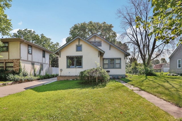 116 3rd Ave SE, Osseo, MN 55369 - tudor home with stucco siding and brick siding