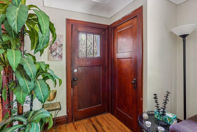 116 3rd Ave SE, Osseo, MN 55369 - entryway featuring wood finished floors and baseboards
