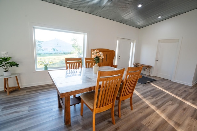 1650 Gunn Rd, Grand Rapids, MN 55744 - dining area with vaulted ceiling, wood finished floors, and recessed lighting