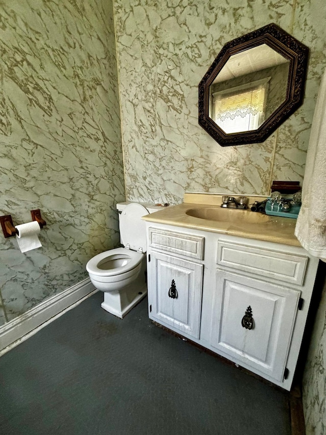 504 3rd Ave SE, Pipestone, MN 56164 - half bathroom with vanity and wallpapered walls