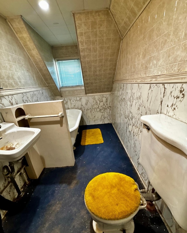 504 3rd Ave SE, Pipestone, MN 56164 - full bathroom with a freestanding tub and tile walls