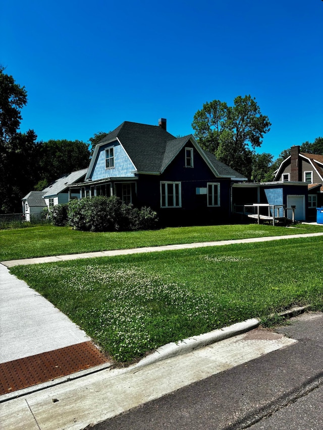 504 3rd Ave SE, Pipestone, MN 56164 - view of front of home with a front yard
