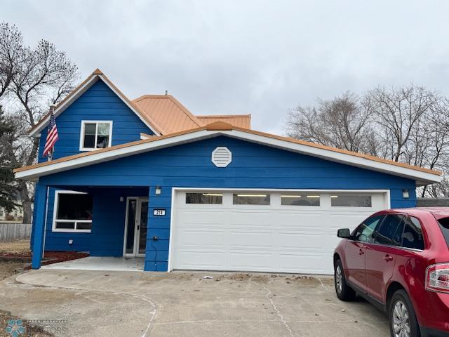 214 7th St, Hatton, ND 58240 - view of front of house featuring concrete driveway