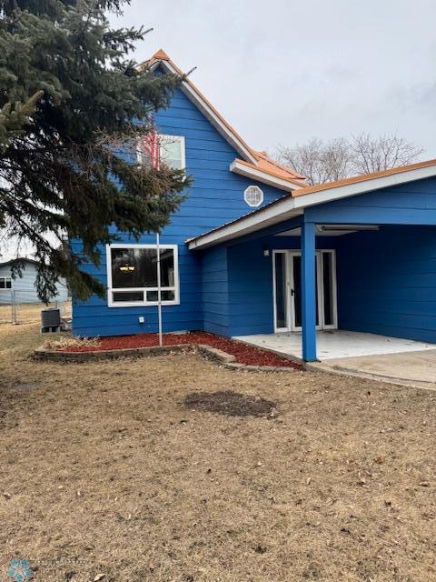 214 7th St, Hatton, ND 58240 - rear view of house featuring a patio area and french doors