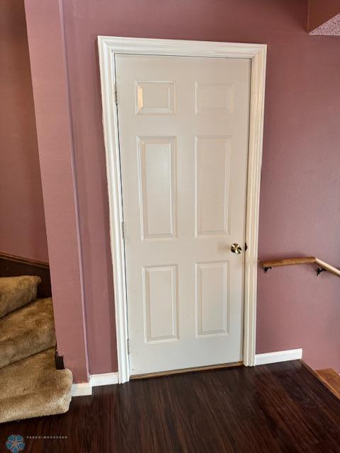 214 7th St, Hatton, ND 58240 - stairs with wood finished floors and baseboards
