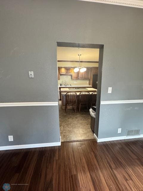 214 7th St, Hatton, ND 58240 - unfurnished dining area with a chandelier and wood finished floors