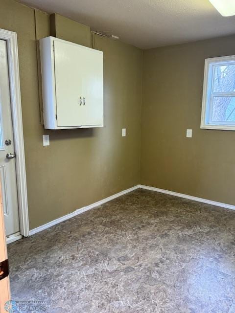 214 7th St, Hatton, ND 58240 - unfurnished room featuring carpet floors and baseboards