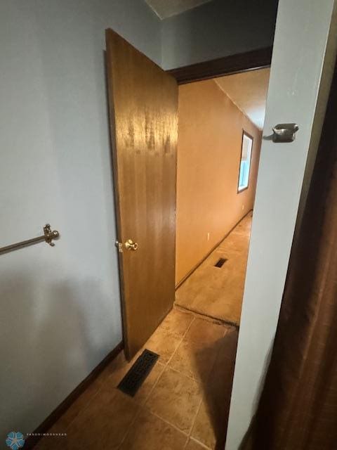 214 7th St, Hatton, ND 58240 - hallway featuring tile patterned floors