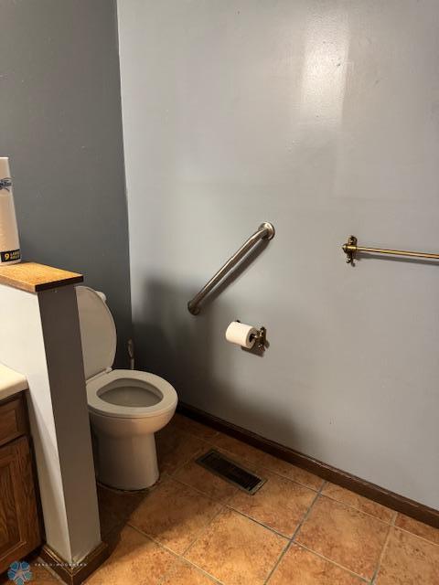 214 7th St, Hatton, ND 58240 - bathroom featuring vanity and tile patterned floors