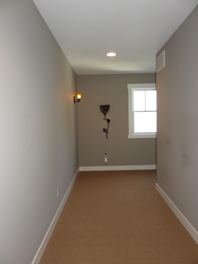 1504 4th St NE, Willmar, MN 56201 - empty room with light carpet and recessed lighting
