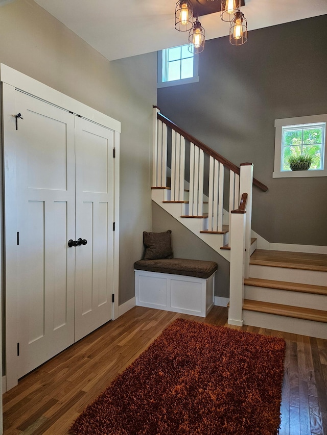 1504 4th St NE, Willmar, MN 56201 - stairs with wood finished floors and plenty of natural light