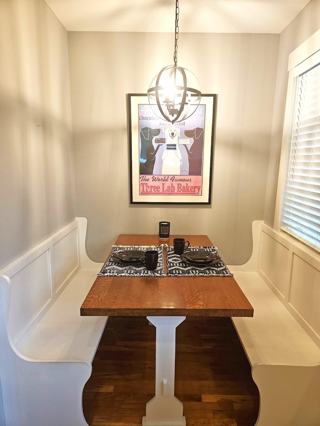 1504 4th St NE, Willmar, MN 56201 - dining space featuring a chandelier, plenty of natural light, wood finished floors, a decorative wall, and breakfast area